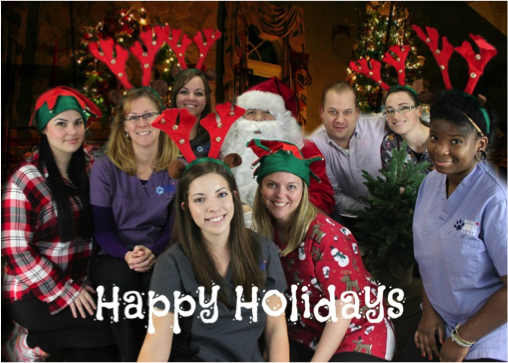 West Hill Animal Clinic staff with Happy Holidays text